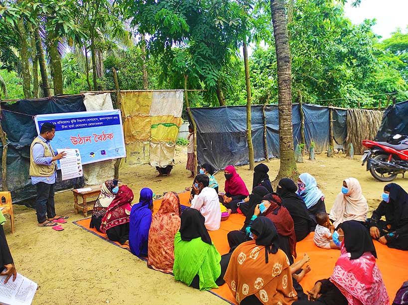 Courtyard meeting with Community Women